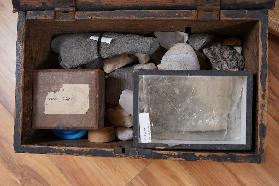 A collection of mineral samples, many with labels, together with two pocket reference books, part of the collection contained within an ebonised pine box; 32 x 18.5 x 19.5cm